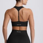 Super Sculpt Seamless T-Back Sports Bra in Black