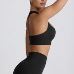 Super Sculpt Seamless T-Back Sports Bra in Black - Image 4