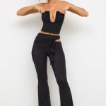 Petite Premium Jersey Rose Detail Mid-Rise Flare Trousers in Black - Image 7