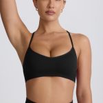 Super Sculpt Seamless Cross-Back Sports Bra in Black