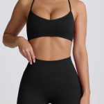 Super Sculpt Seamless Cross-Back Sports Bra in Black - Image 7