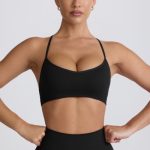Super Sculpt Seamless Cross-Back Sports Bra in Black - Image 8