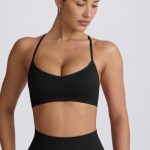 Super Sculpt Seamless Cross-Back Sports Bra in Black - Image 9