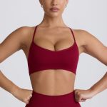 Super Sculpt Seamless Cross-Back Sports Bra in Burgundy - Image 7