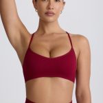 Super Sculpt Seamless Cross-Back Sports Bra in Burgundy - Image 9