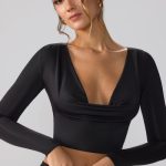 Slinky Jersey Plunge Neck Long Sleeve Crop Top Top in Black - Image 8