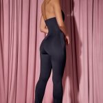 Plunge-Neck Wrap Jumpsuit in Black - Image 6