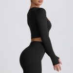 Super Sculpt Seamless Long-Sleeve Crop Top in Black - Image 4
