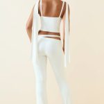 Cut-Out Mid-Rise Flared Trousers in Vanilla - Image 2