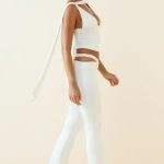 Cut-Out Mid-Rise Flared Trousers in Vanilla - Image 3