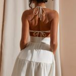 Halter Neck Cut Out Mini Dress in White - Image 2