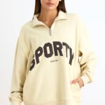 Quarter-Zip Sweatshirt in Bone - Image 5