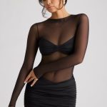 Sheer Panelled Long Sleeve Mini Dress in Black - Image 6