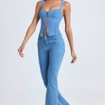 Petite Mid-Rise Flared Jeans in Mid Blue Stonewash