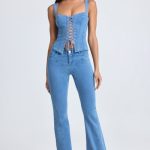 Petite Mid-Rise Flared Jeans in Mid Blue Stonewash - Image 6