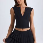 Layered Pleated Low-Rise Mini Skirt in Black - Image 6