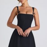 Bow-Detail Pleated A-Line Mini Dress in Black - Image 2