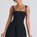 Bow-Detail Pleated A-Line Mini Dress in Black - Image 5