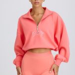 Quarter-Zip Cropped Sweatshirt in Coral - Image 4