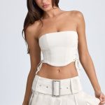 Belted Pleated Low-Rise Micro Mini Skirt in Ecru