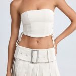 Belted Pleated Low-Rise Micro Mini Skirt in Ecru - Image 5