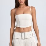 Belted Pleated Low-Rise Micro Mini Skirt in Ecru - Image 7