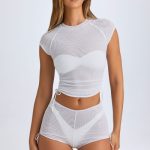 Sheer Ruched Mini Shorts in White - Image 4
