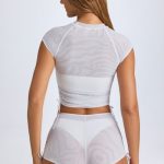 Sheer Ruched Mini Shorts in White - Image 7