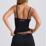 Super Sculpt Seamless Mid-Rise Mini Shorts in Black - Image 6