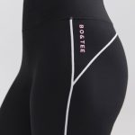 Soft Active Contrast-Trim Flared Trousers in Black - Image 4