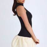 Turtleneck Drop-Waist Bubble Hem Mini Dress in Black - Image 4