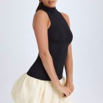 Turtleneck Drop-Waist Bubble Hem Mini Dress in Black - Image 6