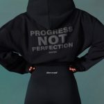 Cropped Drawstring Hooded Sweatshirt in Black - Image 4