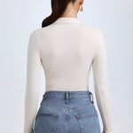 Modal Plunge V-Neck Bodysuit in Ivory - Image 2