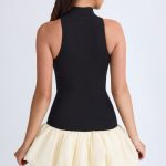Turtleneck Drop-Waist Bubble Hem Mini Dress in Black - Image 3
