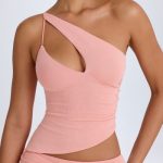 Asymmetric Cut-Out Top in Apricot Pink - Image 4