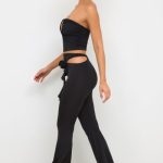Petite Premium Jersey Rose Detail Mid-Rise Flare Trousers in Black - Image 3