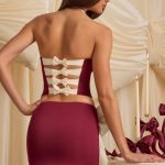 Bow-Detail Low-Rise Mini Skirt in Wine Red - Image 7